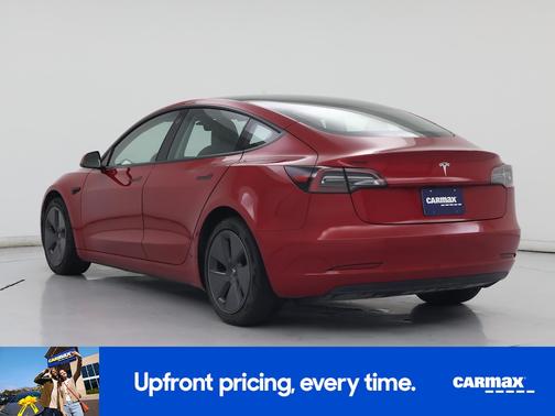 Red 2023 Tesla Model 3
