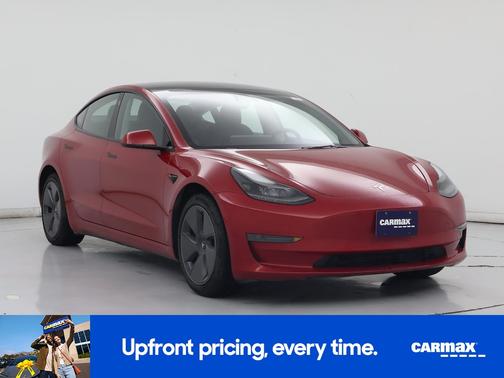 Red 2023 Tesla Model 3