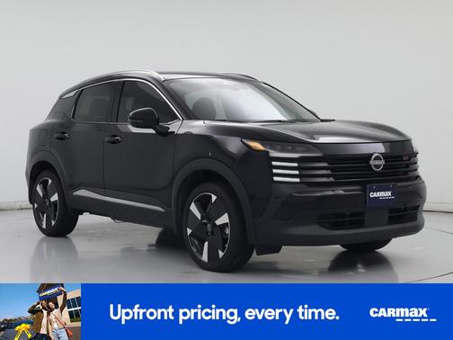 Black 2025 Nissan Kicks SR