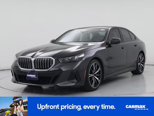 Black 2024 BMW 540 XI