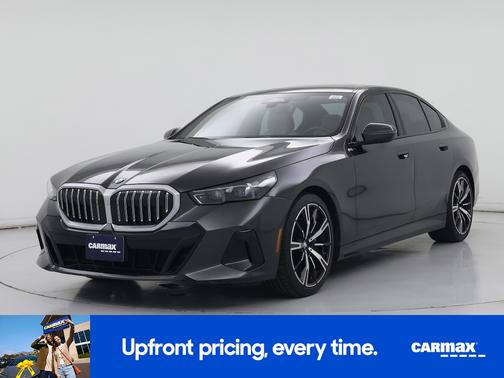 Black 2024 BMW 540 XI