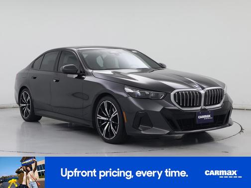 Black 2024 BMW 540 XI