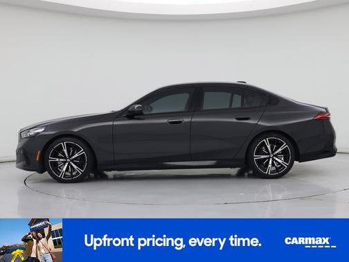 Black 2024 BMW 540 XI