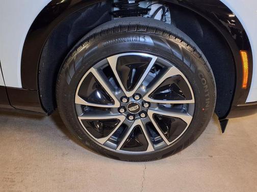 Vibrant White Tricoat 2026 Cadillac OPTIQ Sport