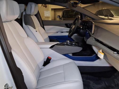 Vibrant White Tricoat 2026 Cadillac OPTIQ Sport