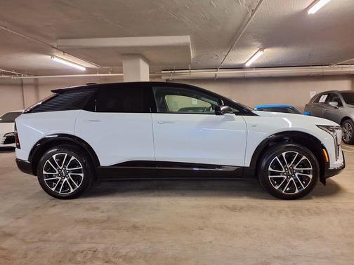 Vibrant White Tricoat 2026 Cadillac OPTIQ Sport