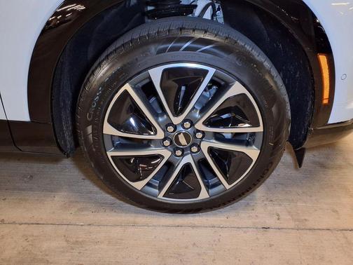 Vibrant White Tricoat 2026 Cadillac OPTIQ Sport