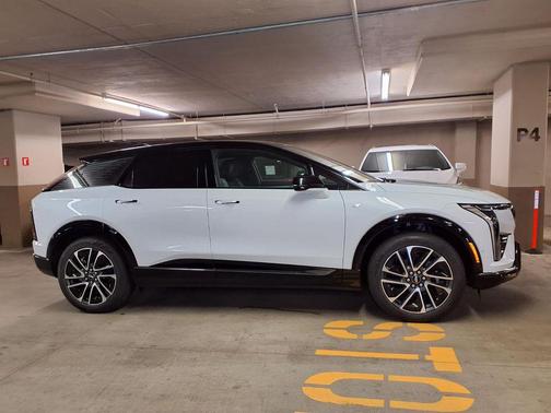 Vibrant White Tricoat 2026 Cadillac OPTIQ Sport