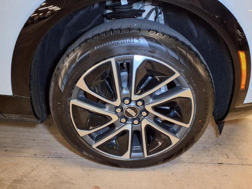Vibrant White Tricoat 2026 Cadillac OPTIQ Sport