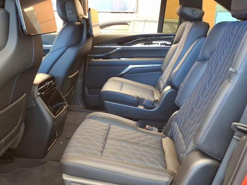 Monarch Orange 2026 Cadillac Escalade IQ Sport