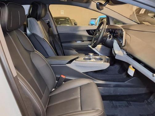 Vibrant White Tricoat 2026 Cadillac OPTIQ Sport