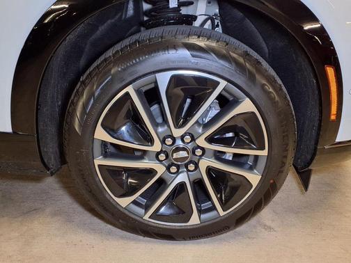 Vibrant White Tricoat 2026 Cadillac OPTIQ Sport