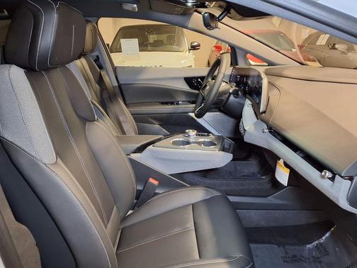 Vibrant White Tricoat 2026 Cadillac OPTIQ Sport