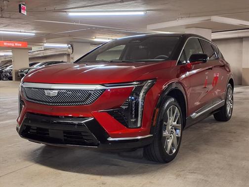 Radiant Red Tintcoat 2025 Cadillac OPTIQ Luxury 1 AWD