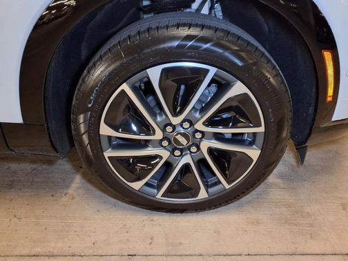 Vibrant White Tricoat 2026 Cadillac OPTIQ Sport