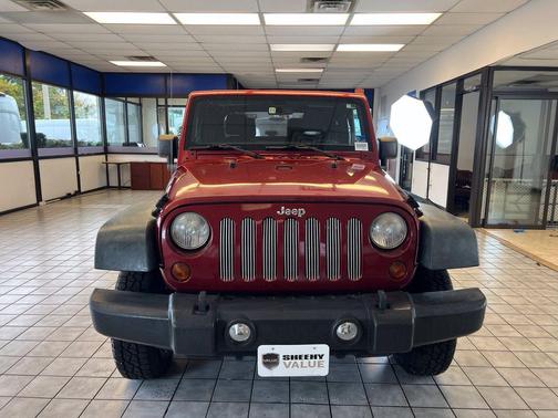 Red 2011 Jeep Wrangler Sport
