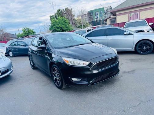 Ruby Red Metallic Tinted Clearcoat 2015 Ford Focus SE