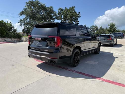 Onyx Black 2025 GMC Yukon XL 4WD AT4 Ultimate