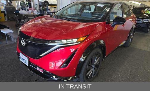 Passion Red Tricoat/Black Diamond Pearl 2023 Nissan ARIYA PLATINUM+