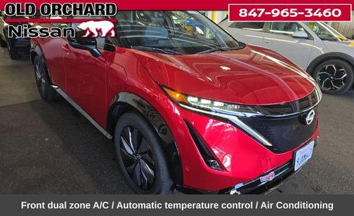 Passion Red Tricoat/Black Diamond Pearl 2023 Nissan ARIYA PLATINUM+