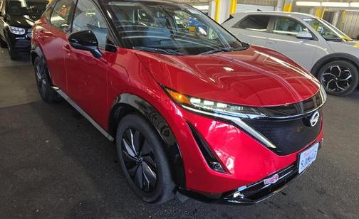 Passion Red Tricoat/Black Diamond Pearl 2023 Nissan ARIYA PLATINUM+