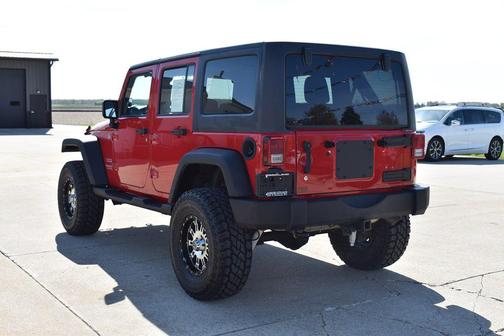 RED 2011 Jeep Wrangler Unlimited Sport