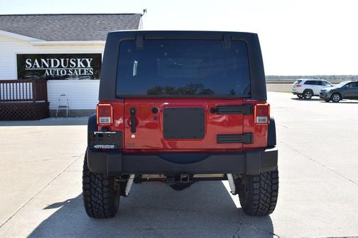 RED 2011 Jeep Wrangler Unlimited Sport