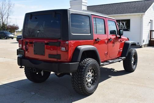 RED 2011 Jeep Wrangler Unlimited Sport