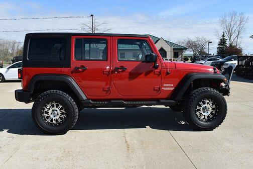 RED 2011 Jeep Wrangler Unlimited Sport