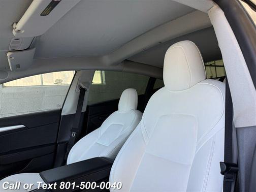 Pearl White Multi-Coat 2022 Tesla Model 3 Performance