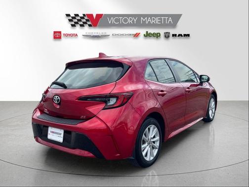 Finish Line Red/Midnight Black Metallic 2023 Toyota Corolla SE