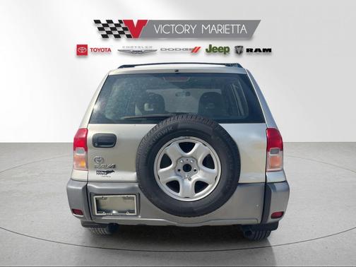 Vintage Gold 2002 Toyota RAV4 Base