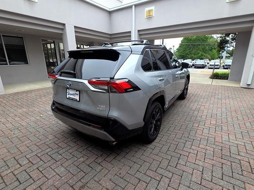 Silver Sky Metallic/Midnight Black Metallic 2023 Toyota RAV4 Hybrid SE
