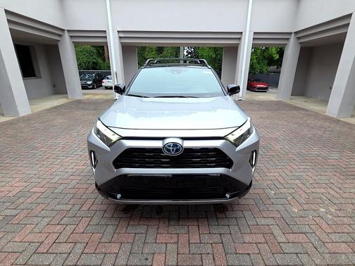 Silver Sky Metallic/Midnight Black Metallic 2023 Toyota RAV4 Hybrid SE