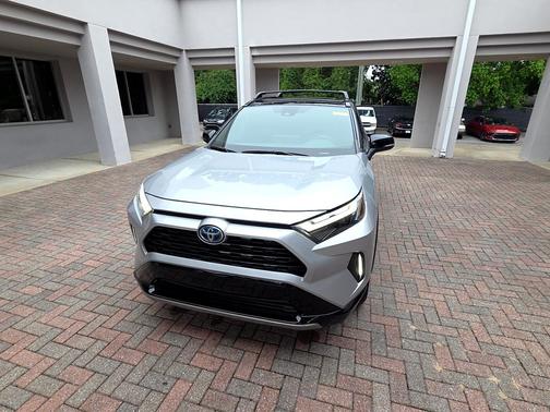 Silver Sky Metallic/Midnight Black Metallic 2023 Toyota RAV4 Hybrid SE