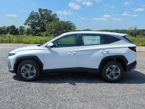 Creamy White Pearl 2026 Hyundai TUCSON Hybrid Blue SE