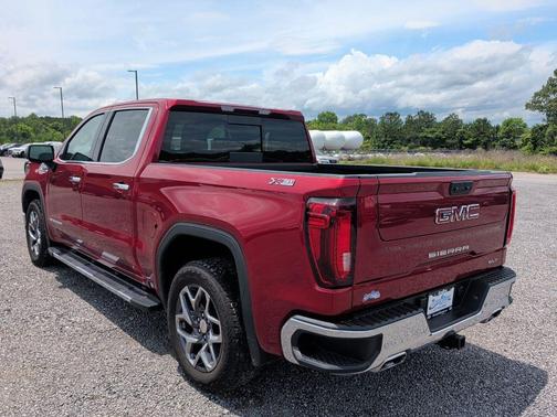 Volcanic Red Tintcoat 2025 GMC Sierra 1500 SLT