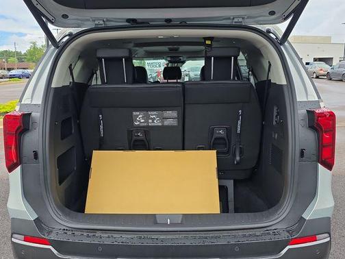 Ivory Silver 2026 Kia Carnival Hybrid SX