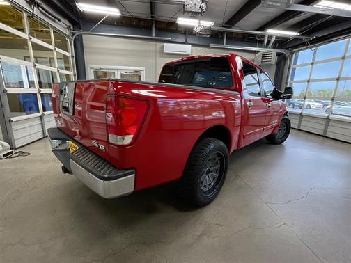 Red 2006 Nissan Titan SE Crew Cab