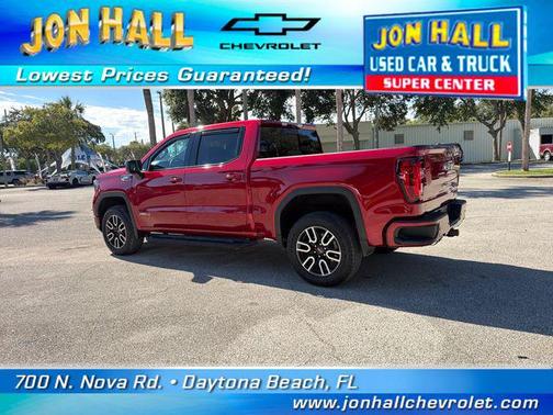 Volcanic Red Tintcoat 2026 GMC Sierra 1500 AT4