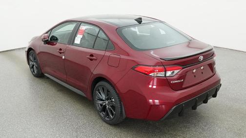 Ruby Flare Pearl/Midnight Black Metallic 2026 Toyota Corolla SE