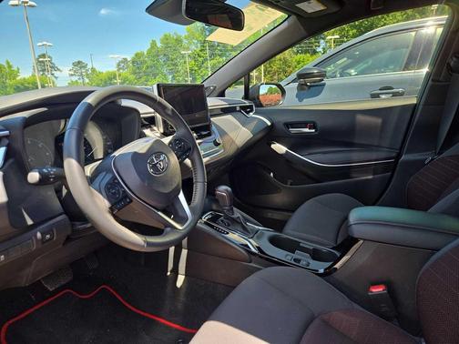 Midnight Black Metallic 2023 Toyota Corolla Hybrid SE Infrared