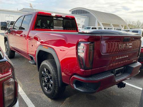 Volcanic Red Tintcoat 2026 GMC Sierra 2500 AT4