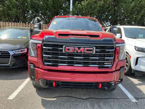 Volcanic Red Tintcoat 2026 GMC Sierra 2500 AT4