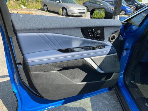 Coastal Blue Metallic 2026 Cadillac OPTIQ Premium Luxury