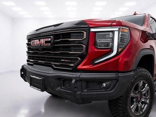 Volcanic Red 2025 GMC Sierra 1500 AT4X