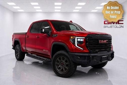 Volcanic Red 2025 GMC Sierra 1500 AT4X