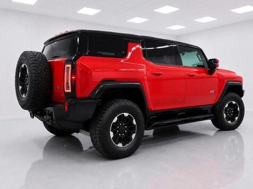 Solar Orange 2025 GMC HUMMER EV SUV 3X