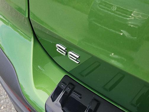 Bright Moss Green W/Black Roof 2025 Volkswagen Taos 1.5T SE Black