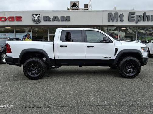 Bright White Clear-Coat Exterior Paint 2026 RAM 1500 RHO Crew Cab 4x4 5'7' Box